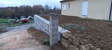 Démolition d'un enrochement et création d'un mur en lego béton