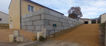 Démolition d'un enrochement et création d'un mur en lego béton